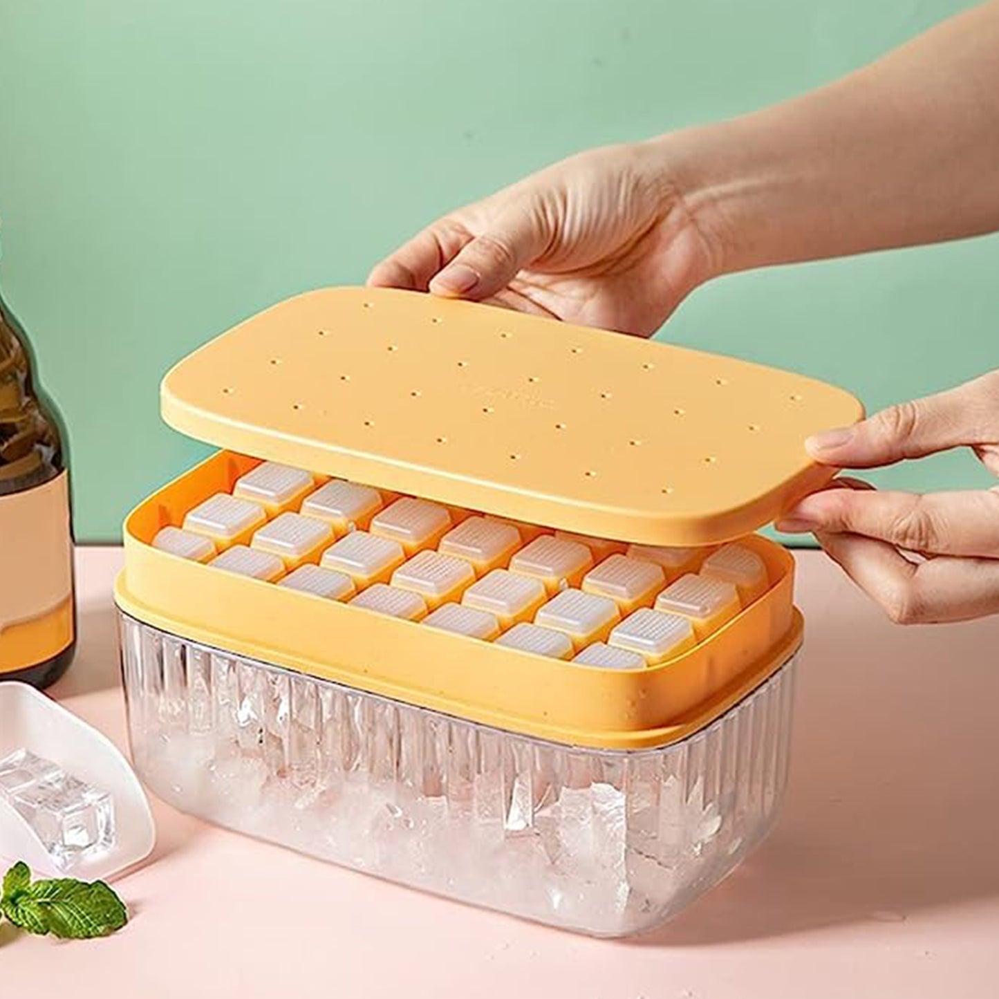 https://www.funsharings.com/cdn/shop/products/Stackable-Silicone-Ice-Cube-Trays-Press-Ice-Tray-Mold-with-Lid-Large-capacity-Ice-Storage-Box-for-Cocktails-Whiskey-Tea-Coffee-28-56-Pieces-Yellow-1.jpg?v=1680796050&width=1445